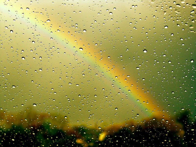 raindrops with rainbow arc