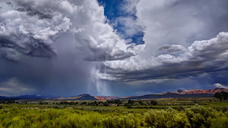 Rainstorm over Desert Landscape