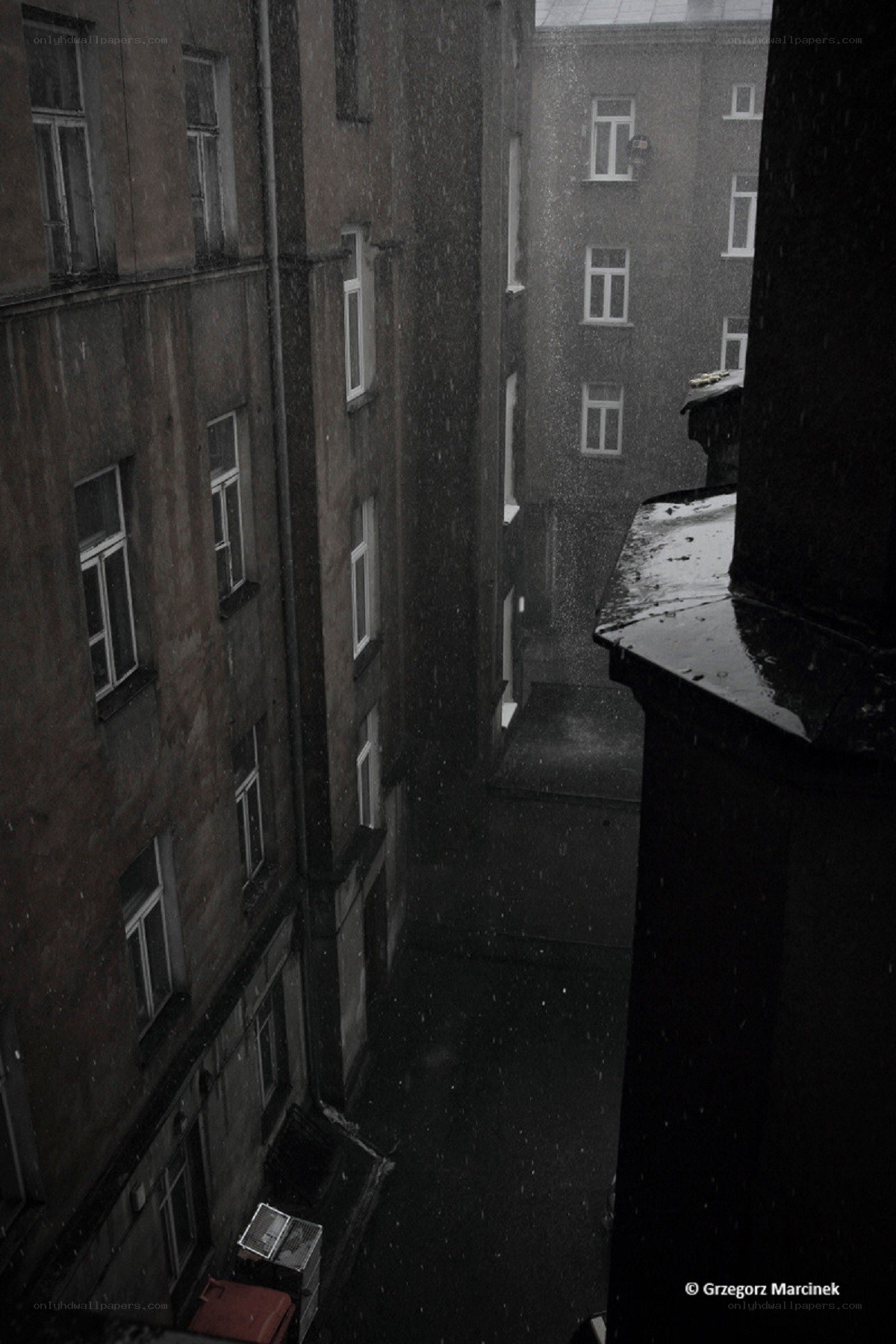Rainy alley between buildings