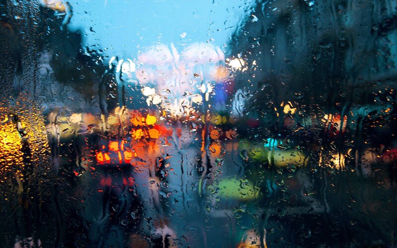 Rainy city lights at night