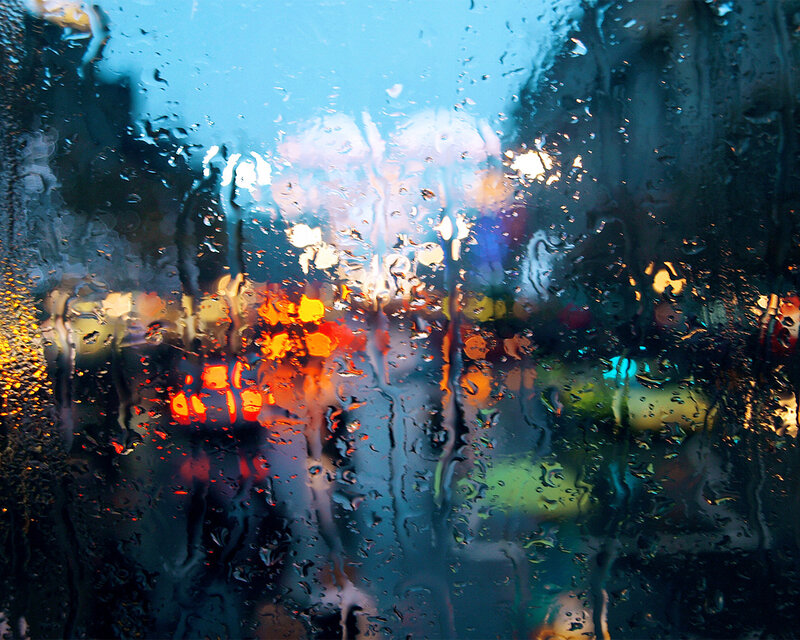 Rainy city lights at night