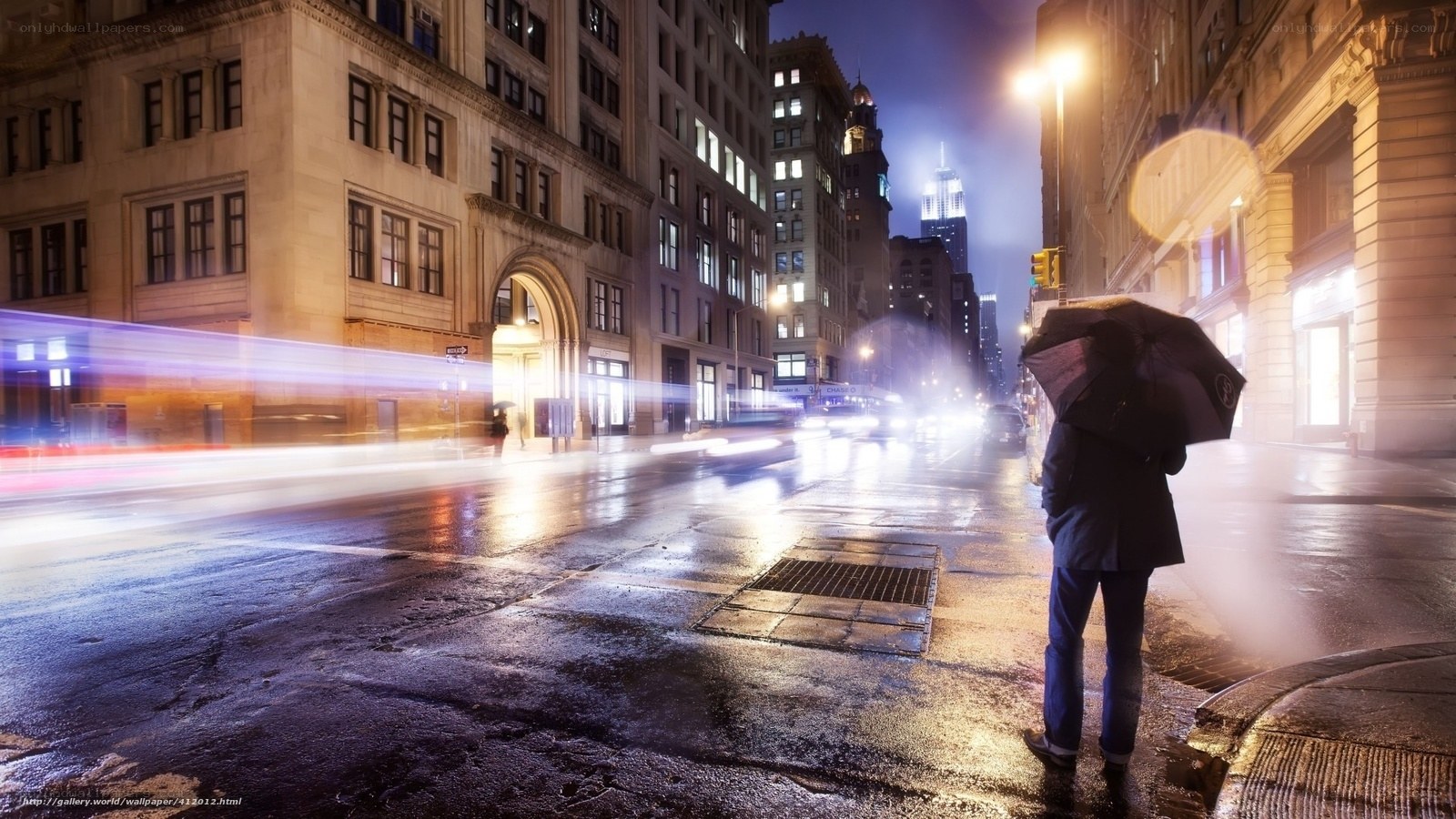 Rainy city night with light trails