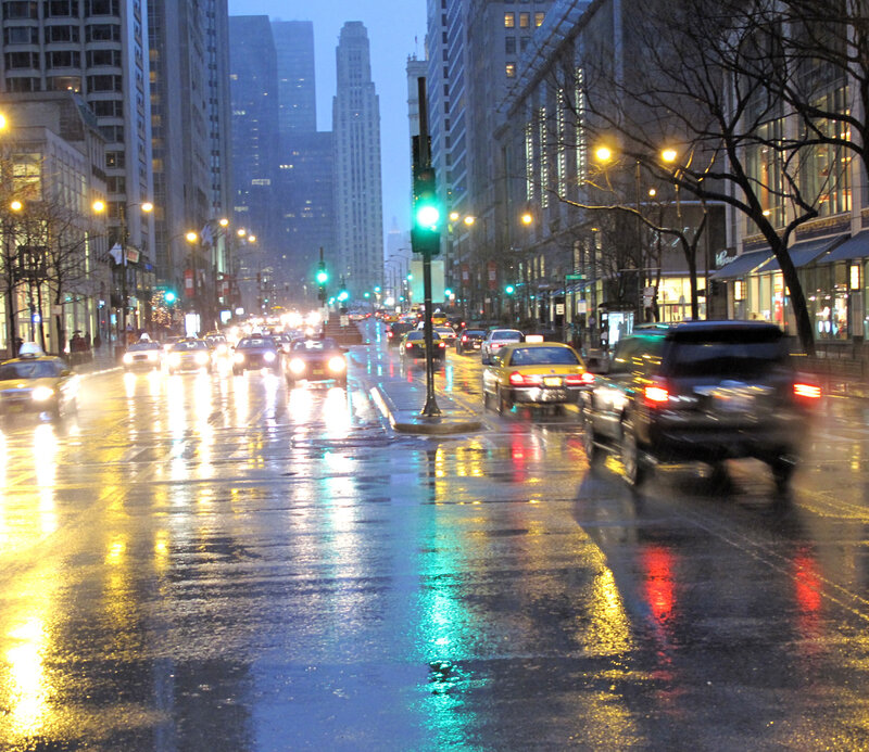 Rainy city street at dusk