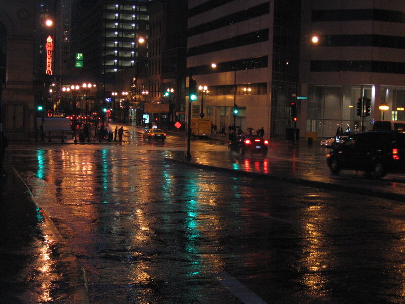 rainy city street at night