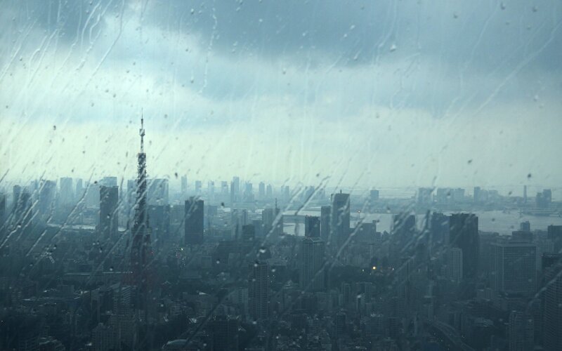 rainy city view from window