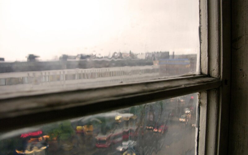 Rainy City View from Window — Gray