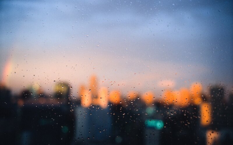 rainy cityscape at dusk