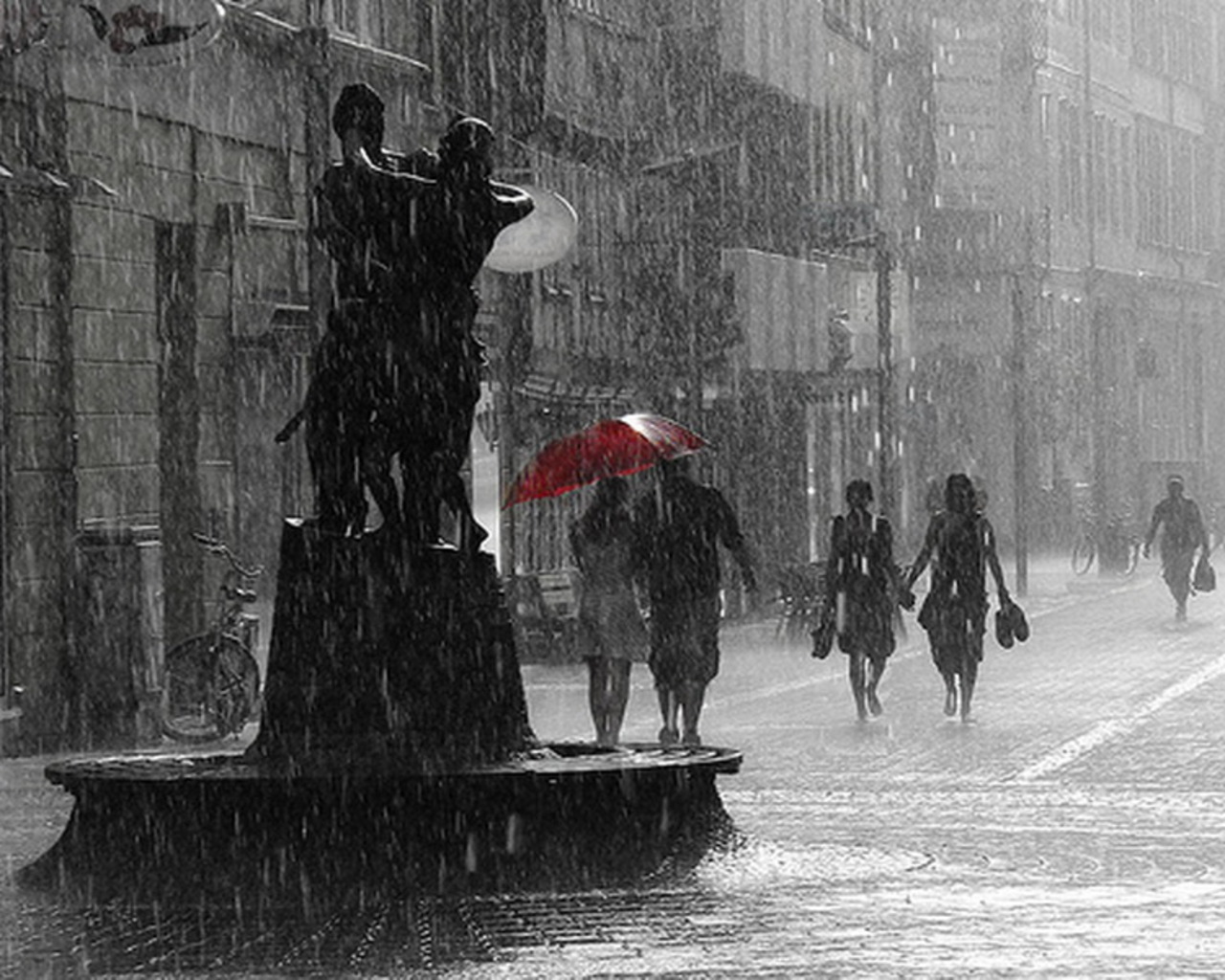 Rainy day with red umbrella