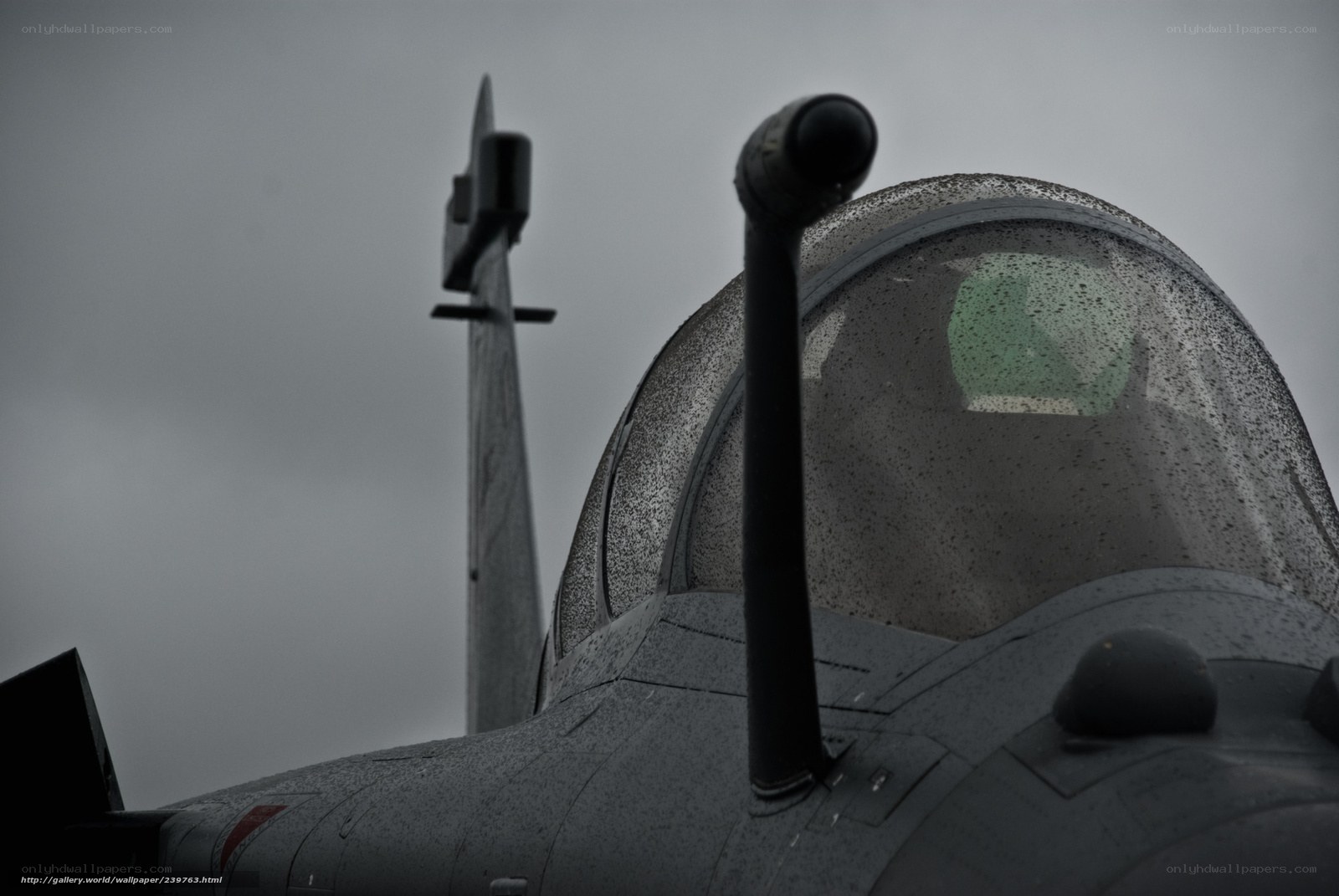 rainy fighter jet cockpit