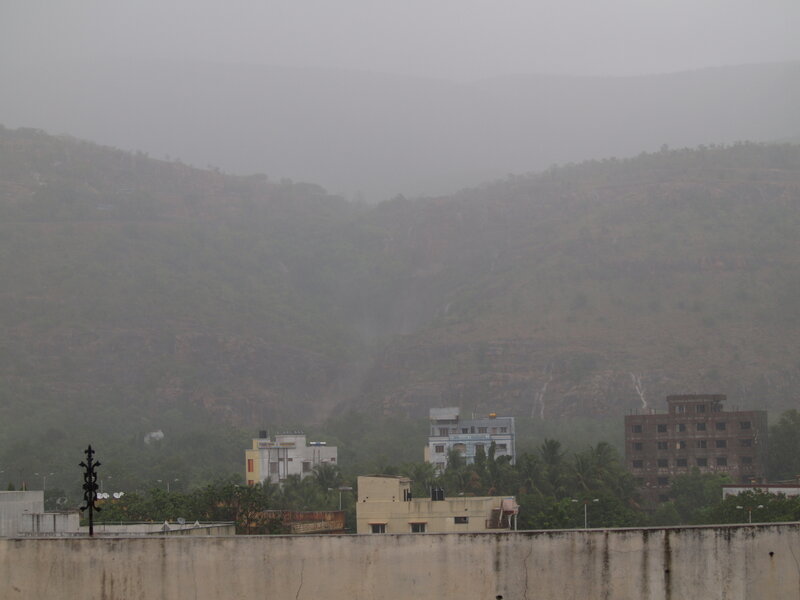 Rainy mountains with buildings