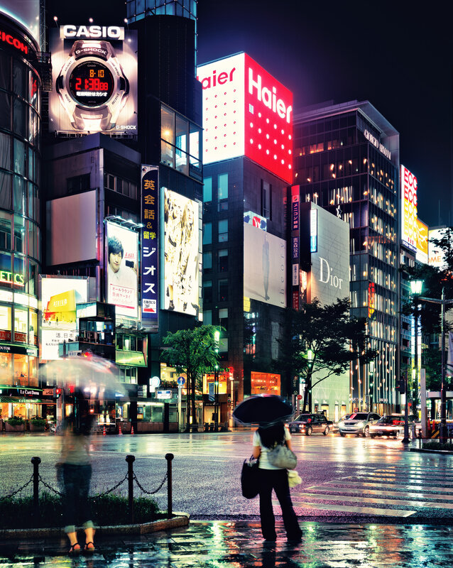 Rainy night in a neon-lit city