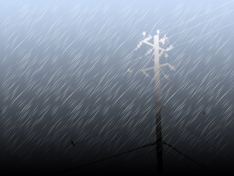 Rainy night with utility pole