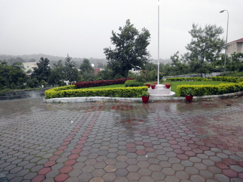 Rainy Park with Flagpole