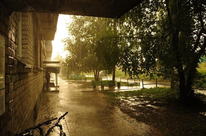 Rainy path under a building