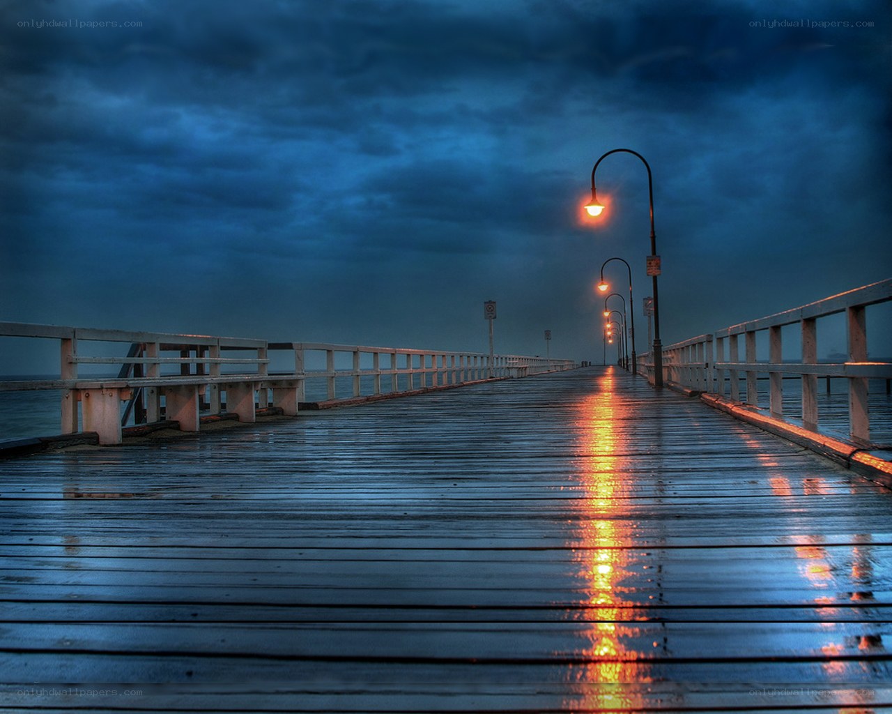 Rainy pier at dusk