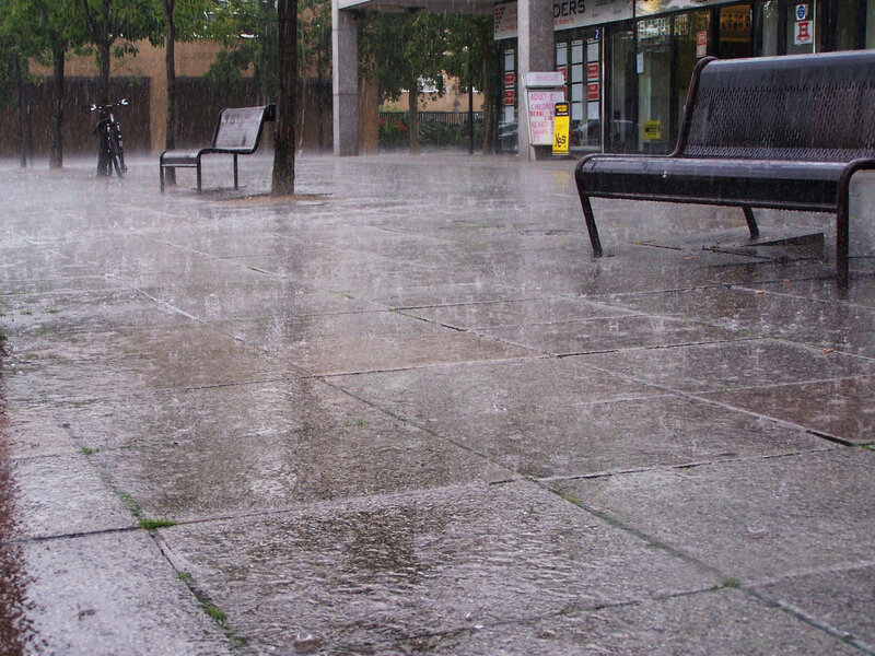 Rainy Sidewalk Scene