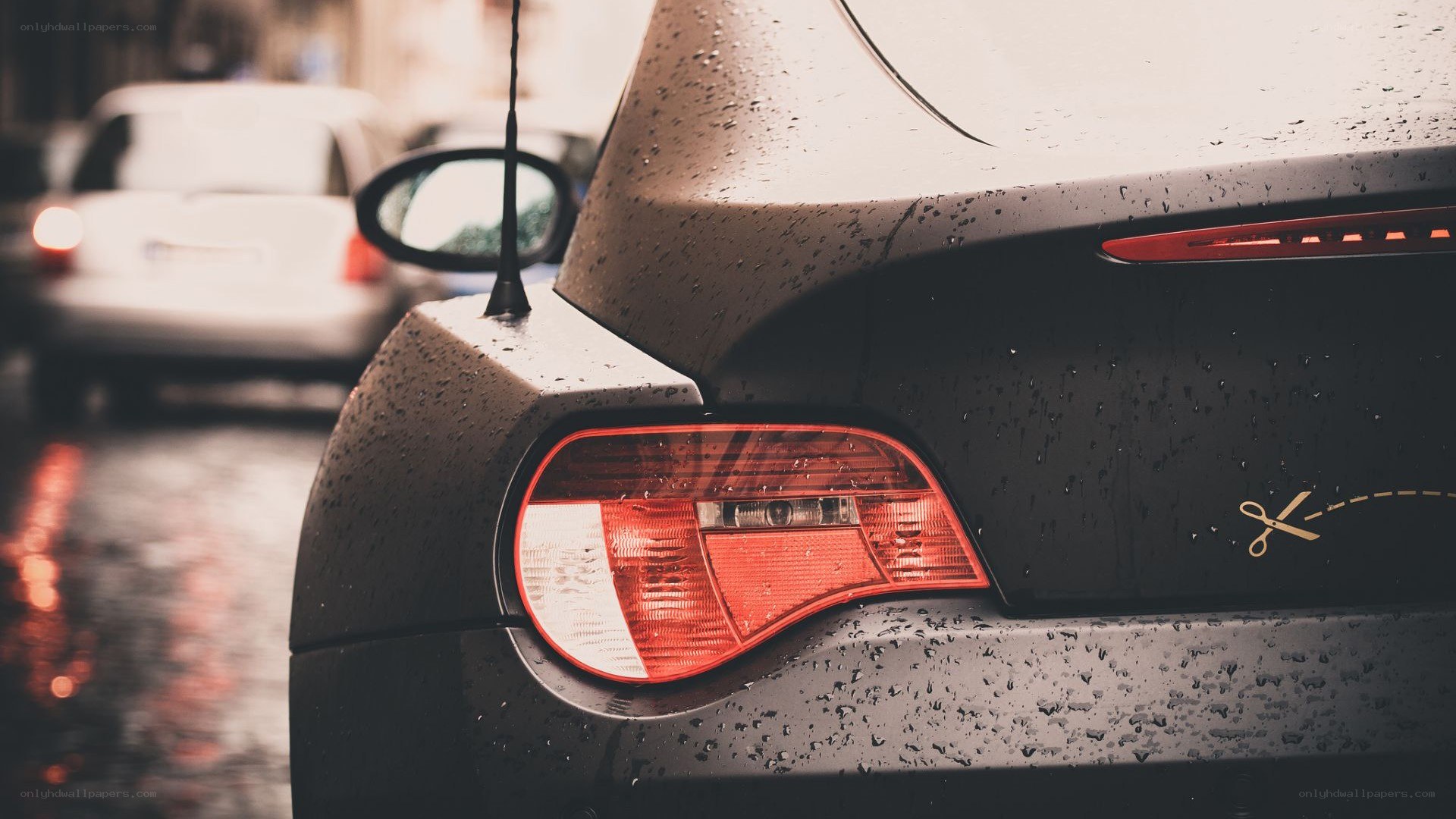 rainy street car rear view
