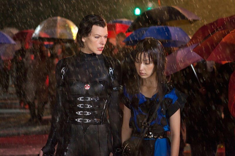 Rainy street scene with two women