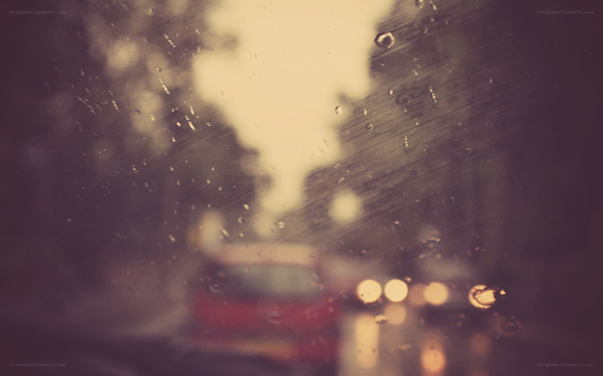 rainy street view from car