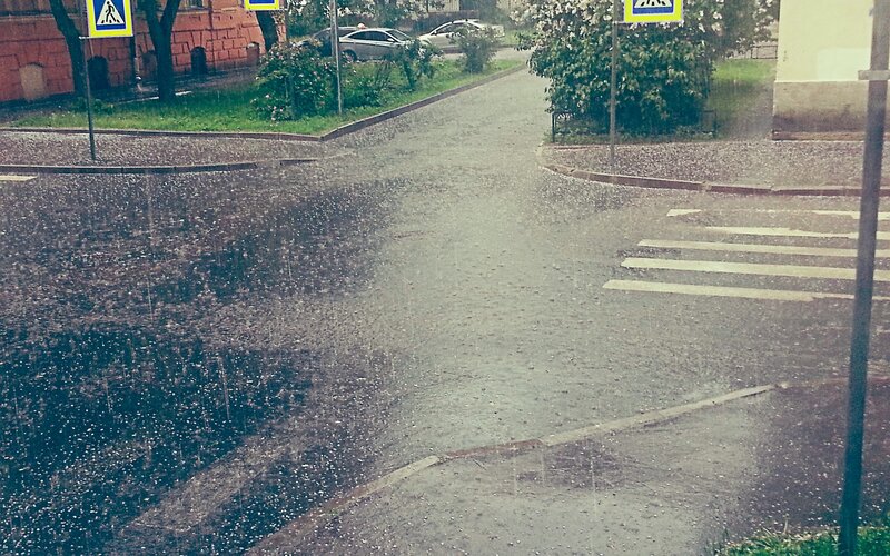 Rainy street with crosswalk