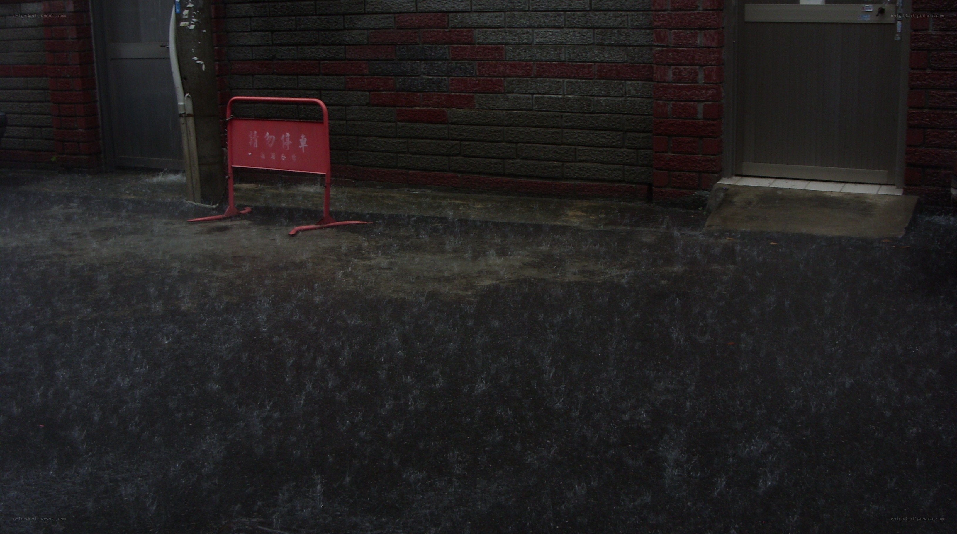 Rainy street with red sign