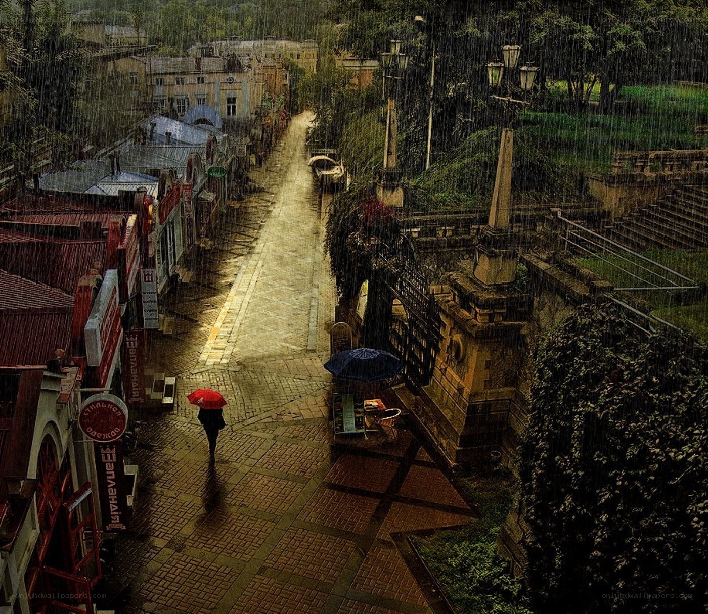 Rainy street with umbrellas