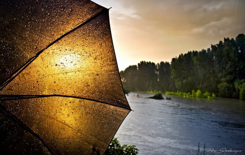 Rainy sunset by the river