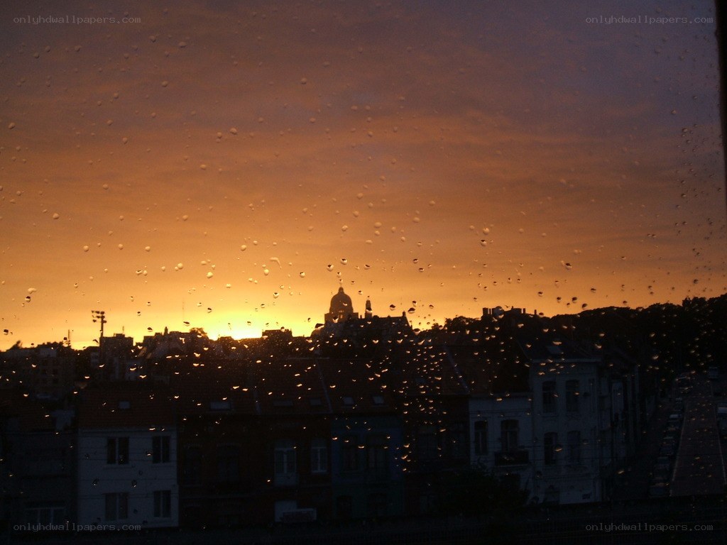 rainy sunset over city