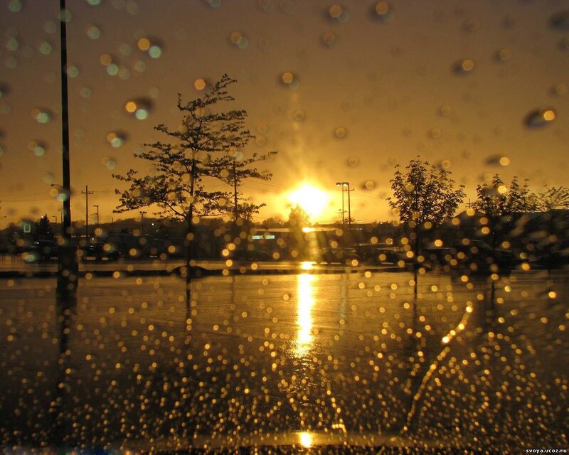 rainy sunset through a wet window