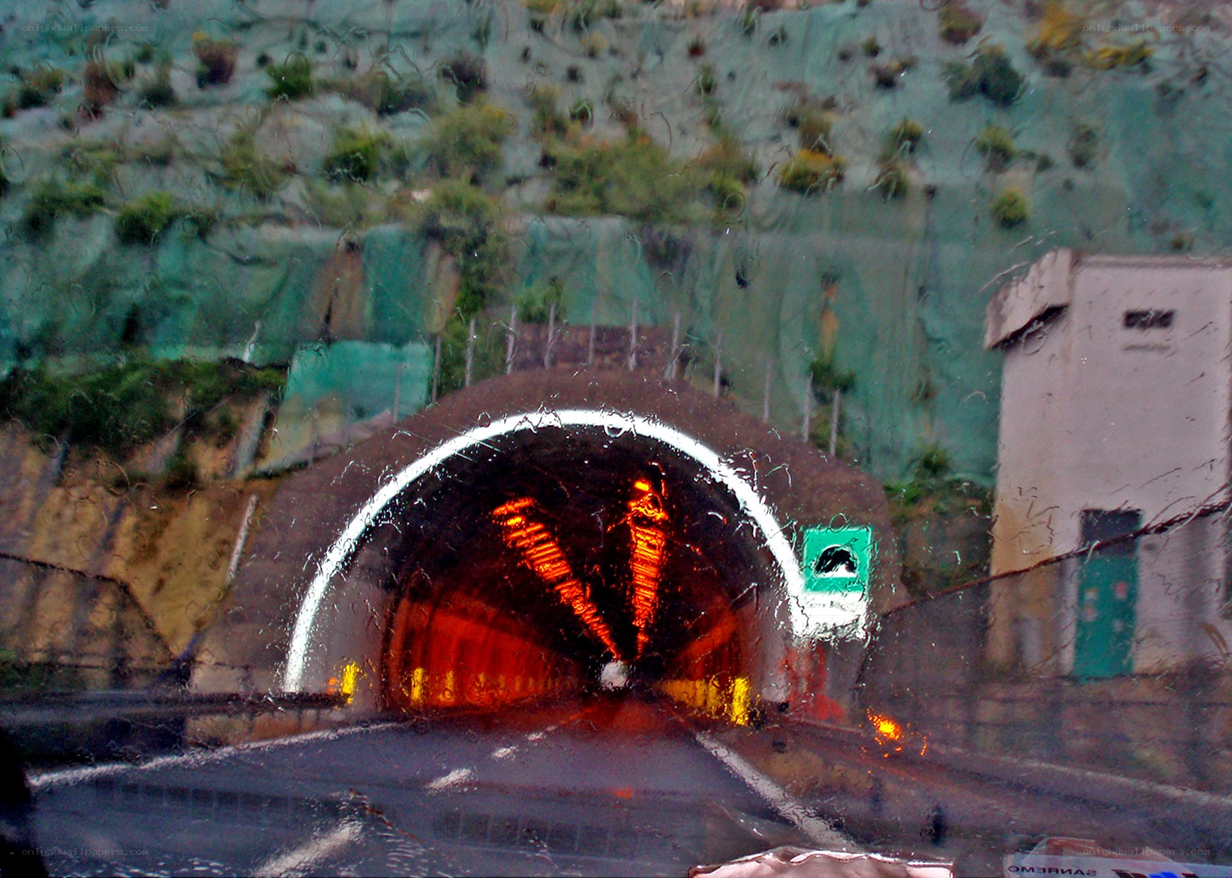 rainy tunnel entrance view