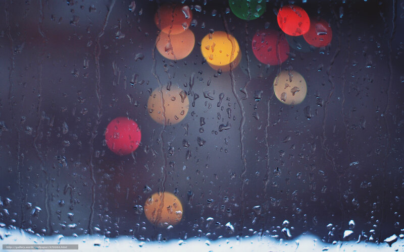 Rainy window with bokeh lights