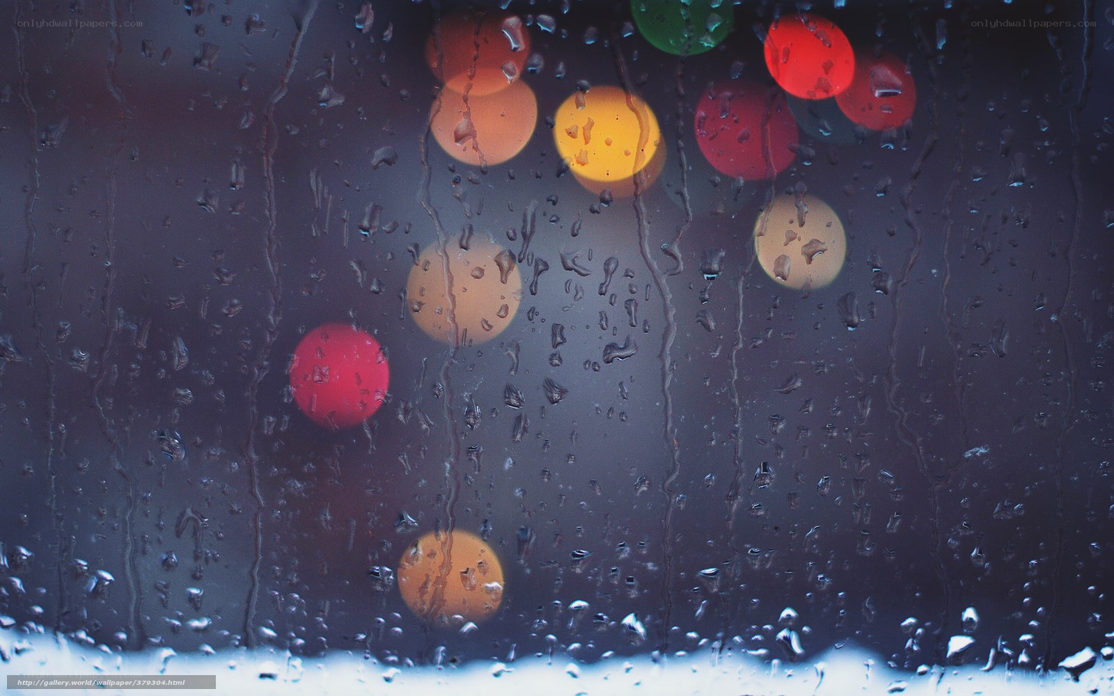Rainy window with bokeh lights