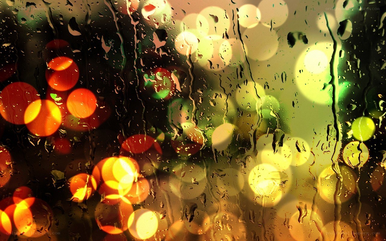 rainy window with bokeh lights