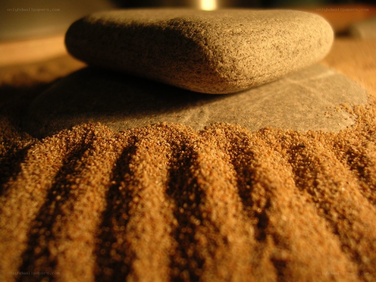 Raked sand and stones