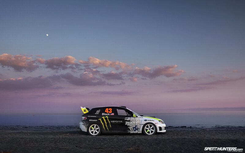 rally car at sunset by the water