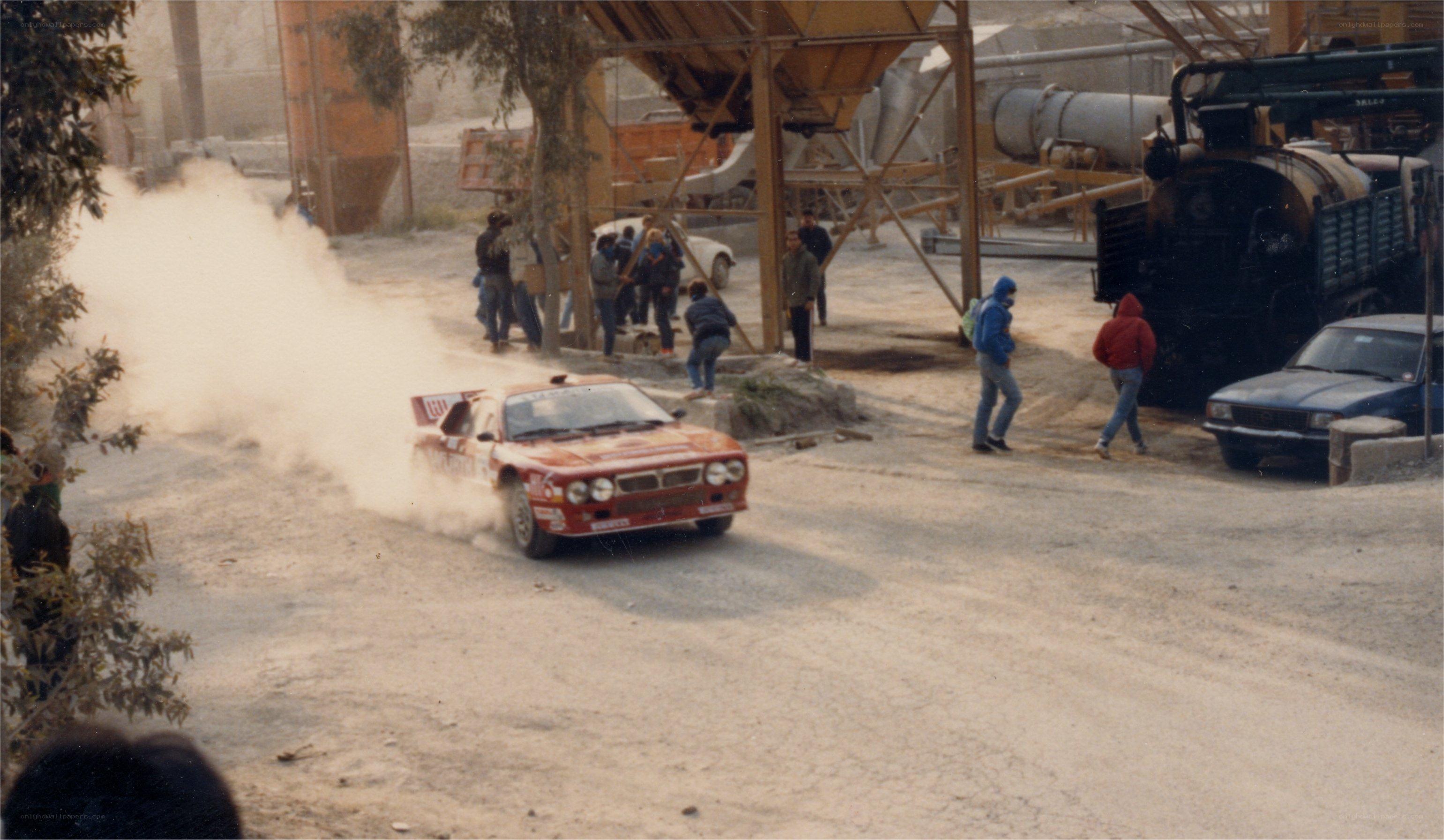 Rally car drifting on dirt