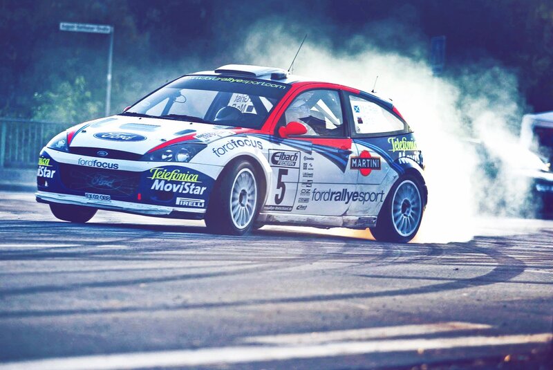 Rally car drifting on track