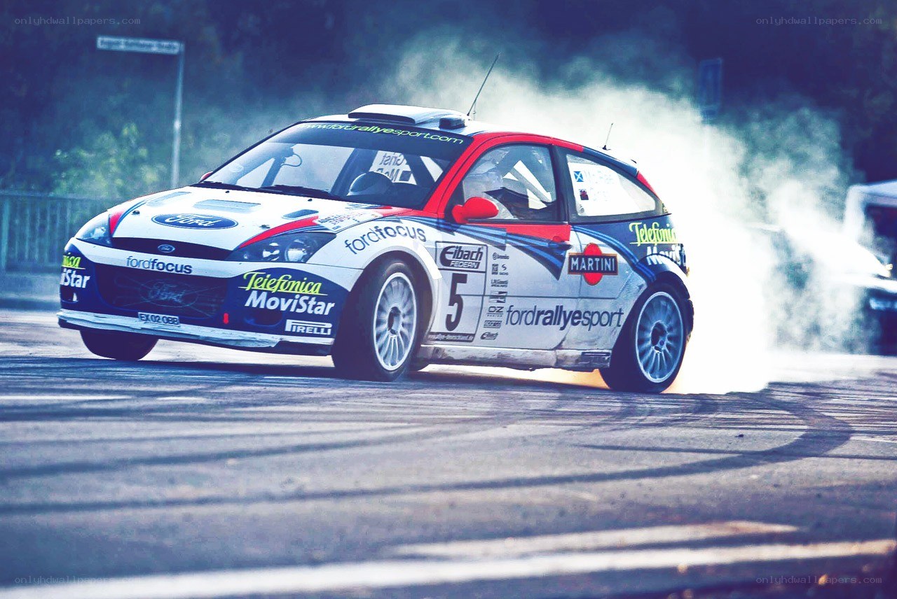 Rally car drifting on track
