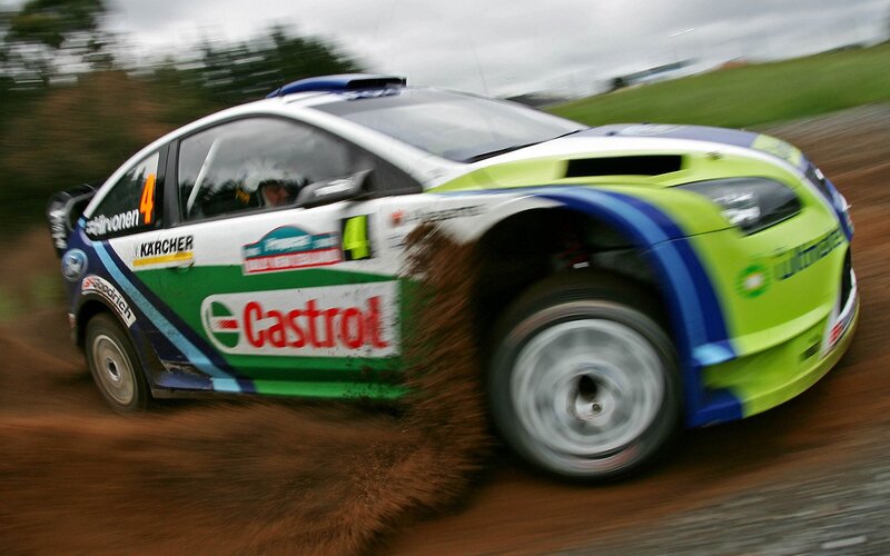 rally car in action on dirt