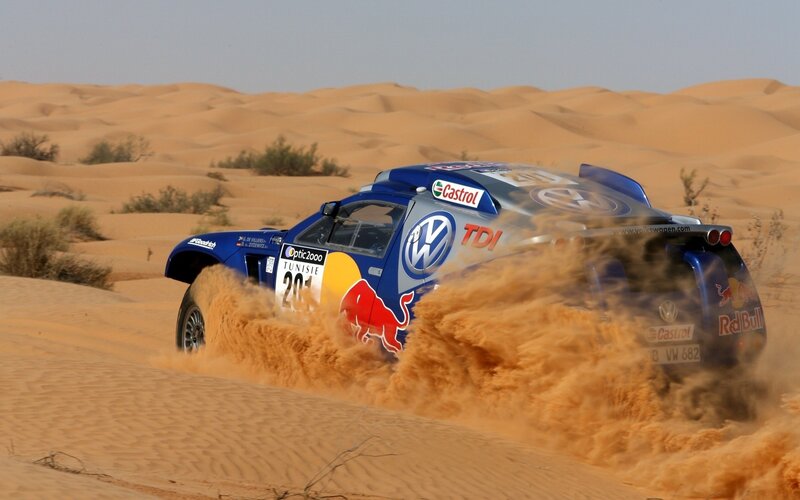 Rally Car in Desert — Blue, Dynamic, Afternoon, Photograph, Sand Dunes, Dust Cloud
