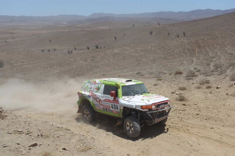 Rally Car in Desert — Brown, Arid, Afternoon, Photograph