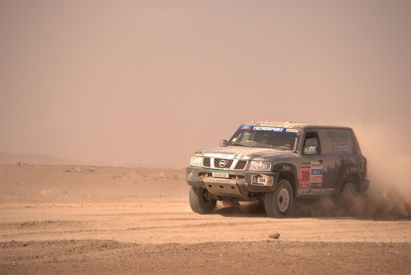 Rally Car in Desert — Brown, Dusty, Afternoon