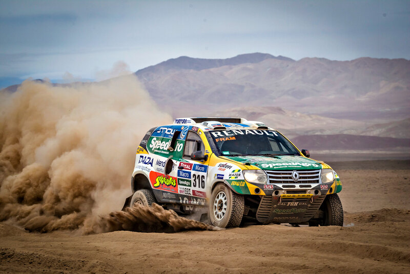 Rally Car in Desert — Brown, Dynamic, Afternoon, Photograph, Dust Cloud, Mountains