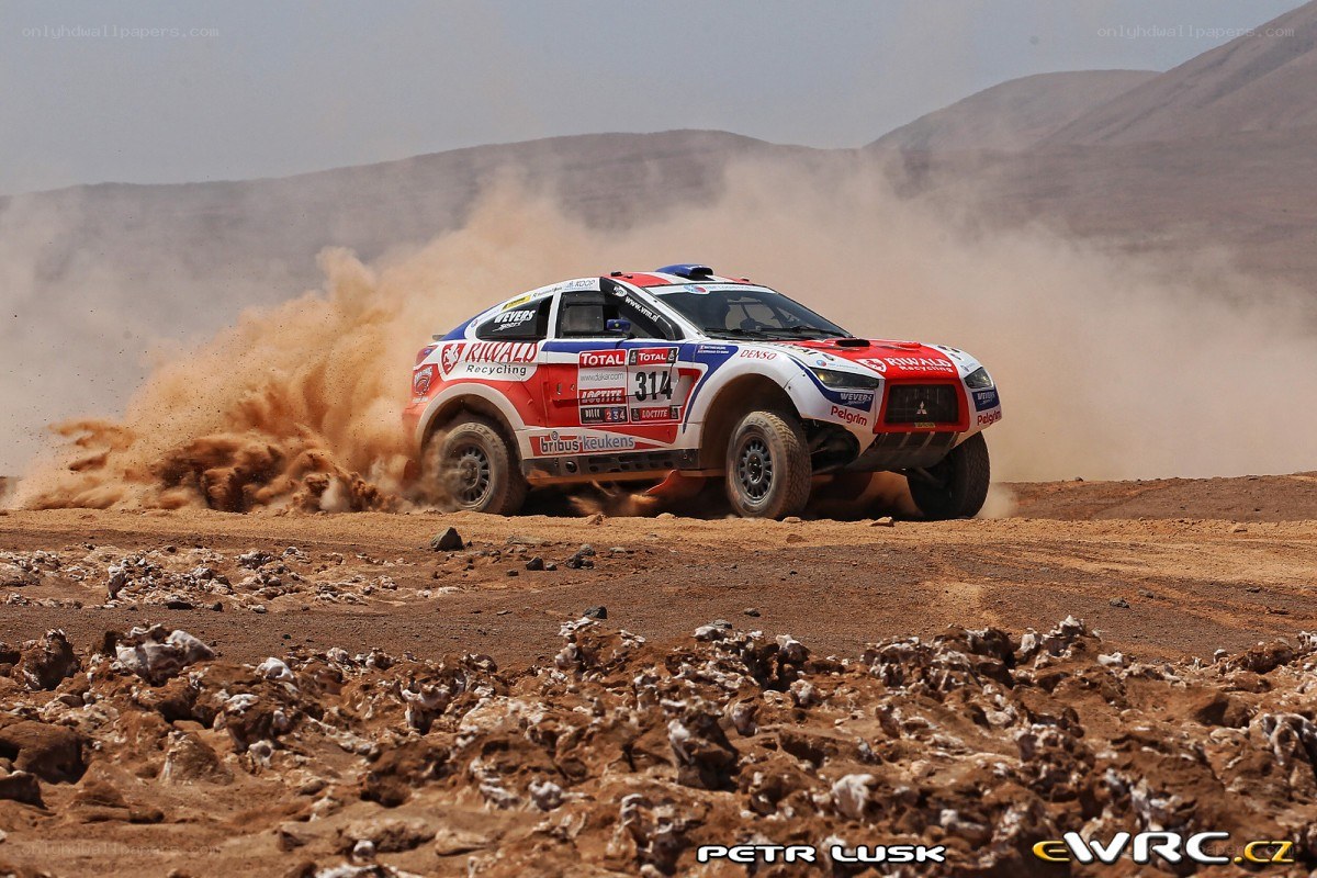 Rally car in desert dust