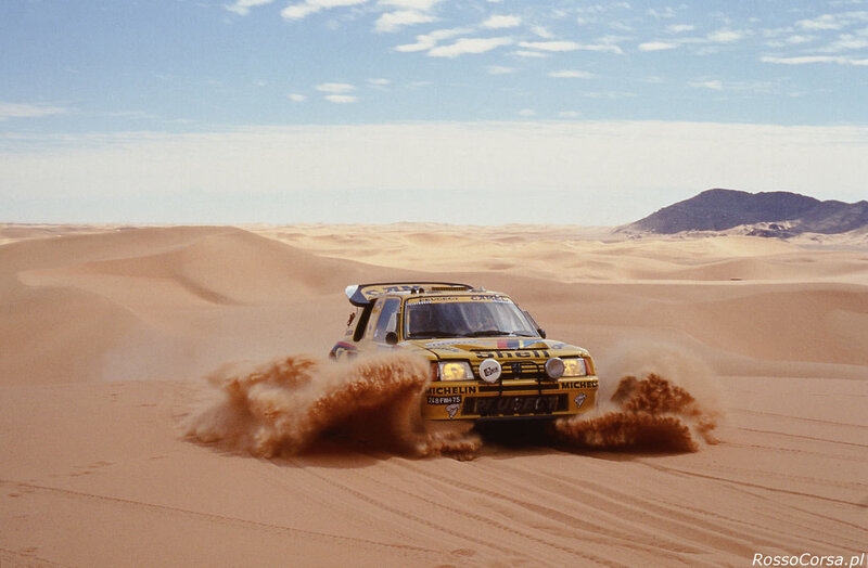 rally car in desert sand