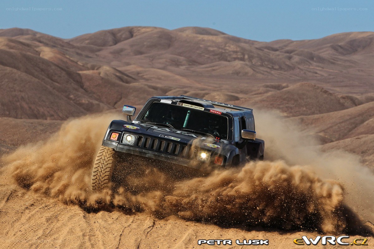 Rally car in desert sand