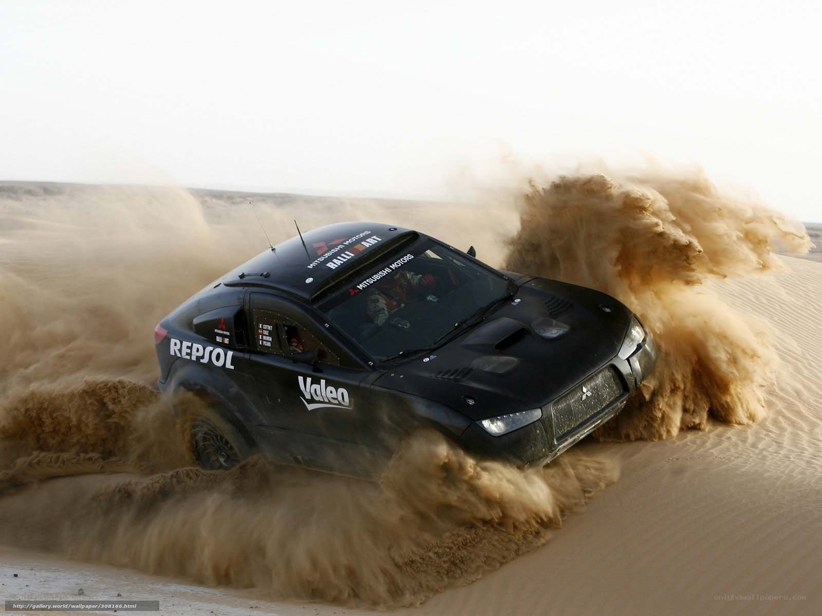 Rally car in desert sand