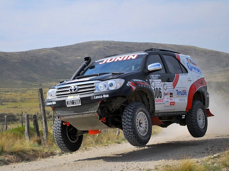 Rally Car in Mid-air — Black, Dynamic, Afternoon
