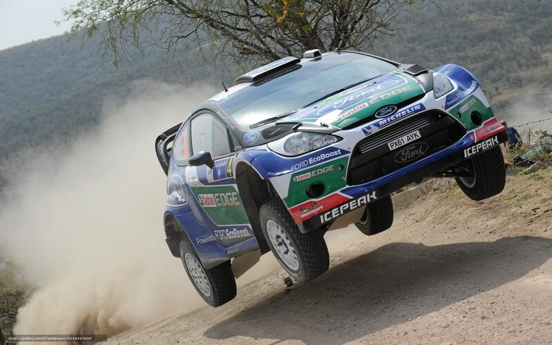 Rally Car in Mid-air — Blue, Dynamic, Afternoon, Photograph, Dust Cloud