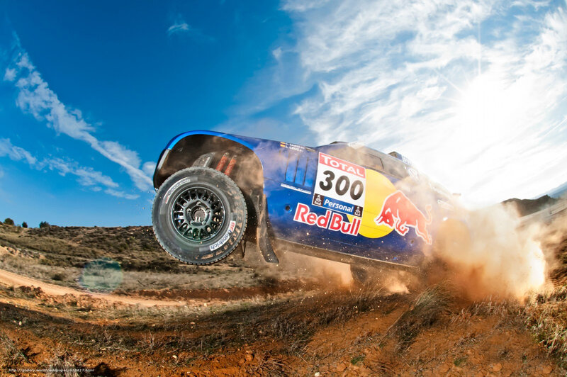 Rally car in mid-air jump